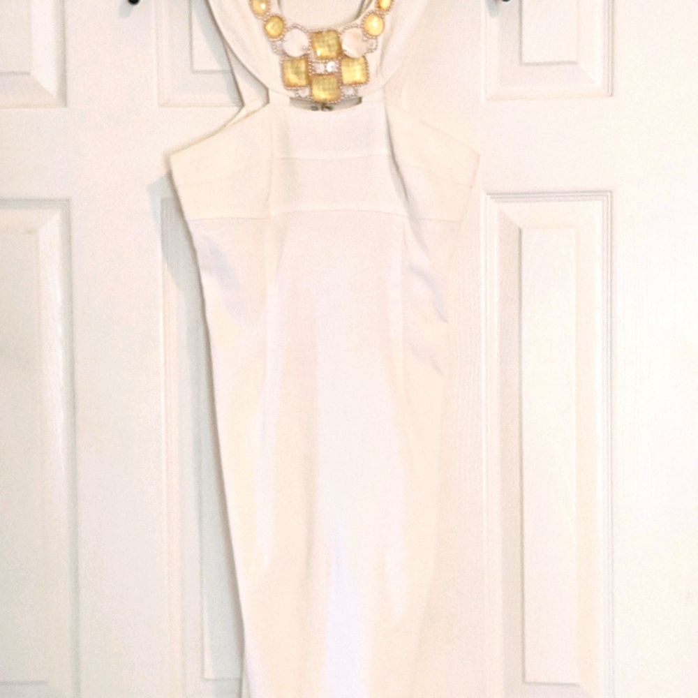Adorable dress w/ gold jewels across the neck line